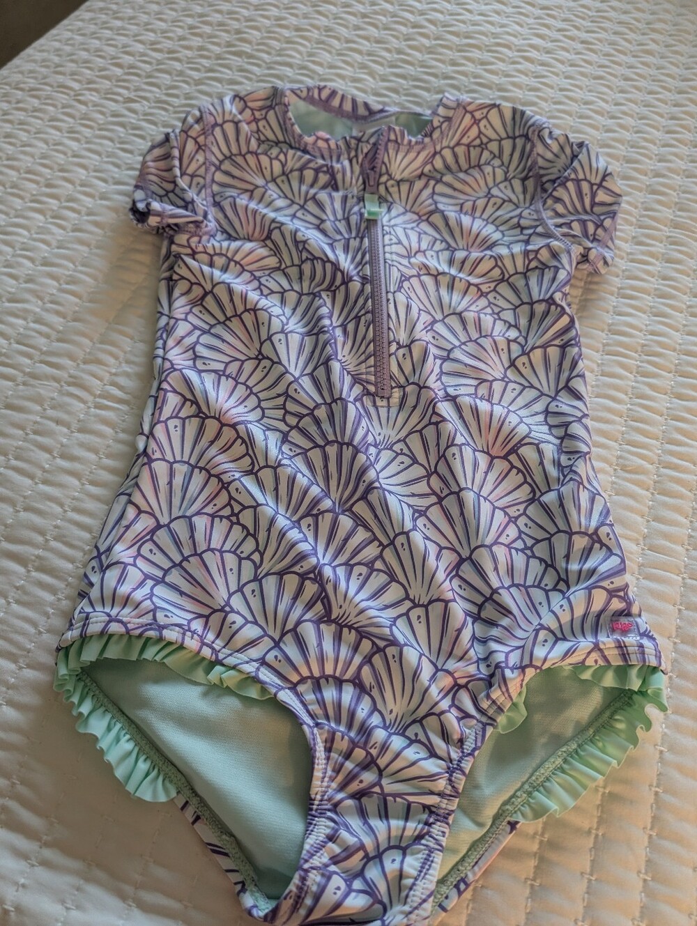 Ruffle Butts Purple and Mint Shell-Print Girls One-Piece Rash Guard Swimsuit
